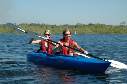 Two women in a kayak.